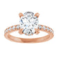 Rose Gold Oval Engagement Ring With Hidden Halo