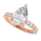 Rose Gold Pear Cut Engagement Ring With Hidden Halo