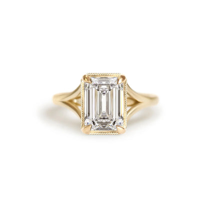 Yellow Gold Split Shank Emerald Solitaire Engagement Ring