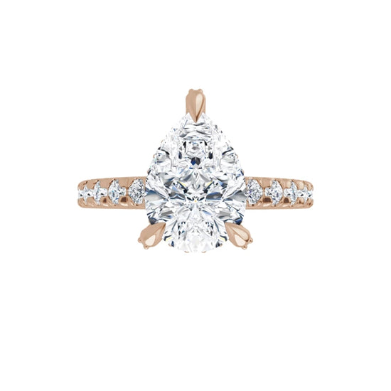 Rose Gold Pear Cut Engagement Ring With Hidden Halo