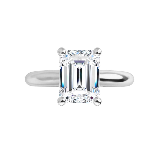 White Gold Emerald Solitaire Engagement Ring